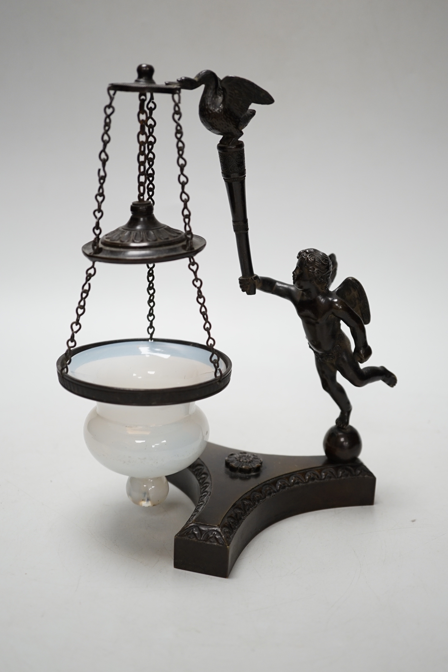 An early 19th century bronze ‘angel’ perfume warmer, 20cm high